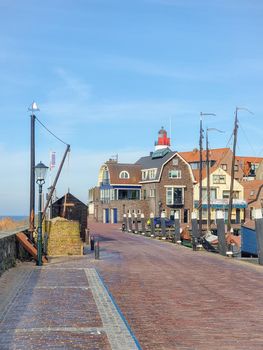 old harbor of the fishing village Urk in Flevoland Netherlands, beautiful Spring day at the former Island of Urk Holland Europe February 2021