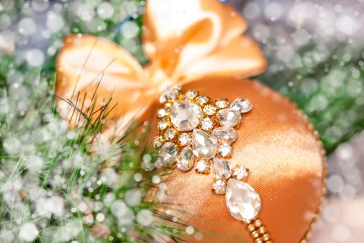 Beautiful Christmas ball for Christmas tree. Ball in rhinestones. New year's greetings, greeting card, calendar. 