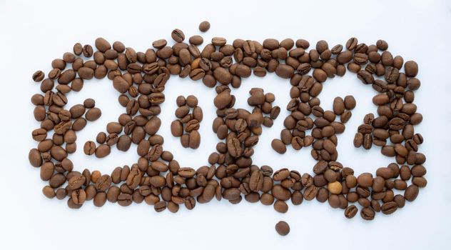 The numbers 2022 on the background of coffee beans. New Year's Eve 2022.New Year's calendar.