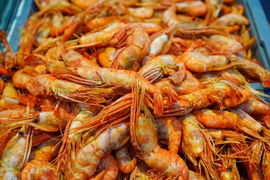 Seafood in the window of the shopping pavilion of the city market. Vladivostok, Russia