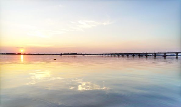 The atmosphere along the river has a beautiful sky when the sun is setting.