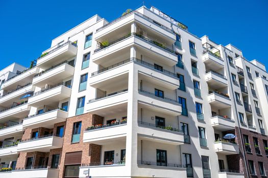 Modern white tenement buildings seen in Berlin, Germany