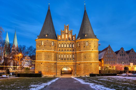 The iconic Holsten Gate in Luebeck, Germany, at night