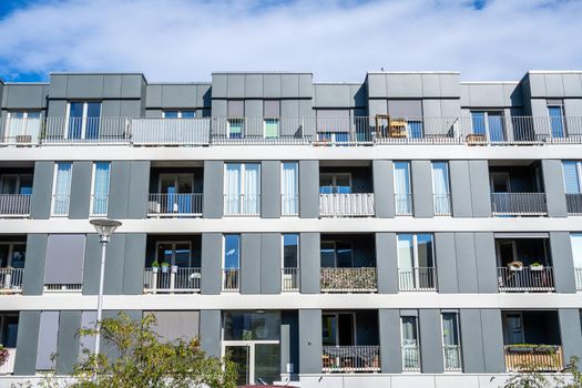 Modern gray apartment building seen in Berlin, Germany