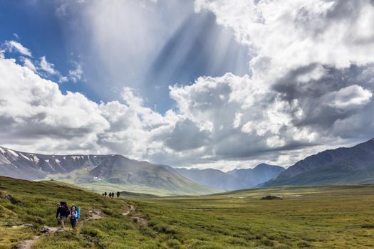 Green mountain valley and sky, travel. On the Oroy pass. Mountain Altai. Siberia. Russia.