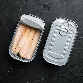 Canned Mackerel fillet, fish preserves set, in tin can, on black background, top view flat lay, square format