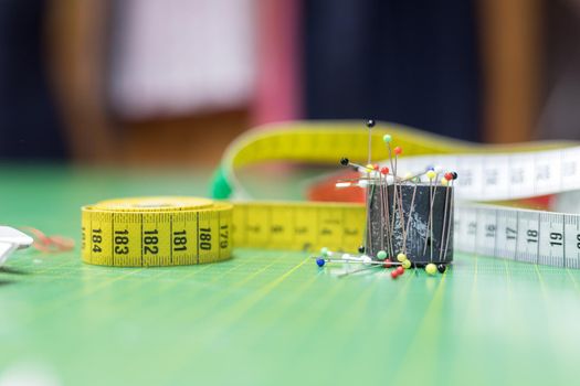 Close up of measuring tape in a textile workshop