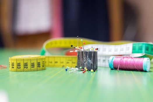 Close up of measuring tape in a textile workshop