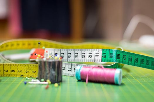 Close up of measuring tape in a textile workshop