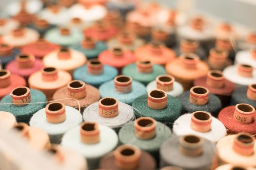 Variety of colorful sewing threads, birds eye