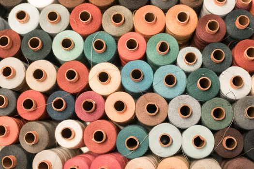 Variety of colorful sewing threads, birds eye