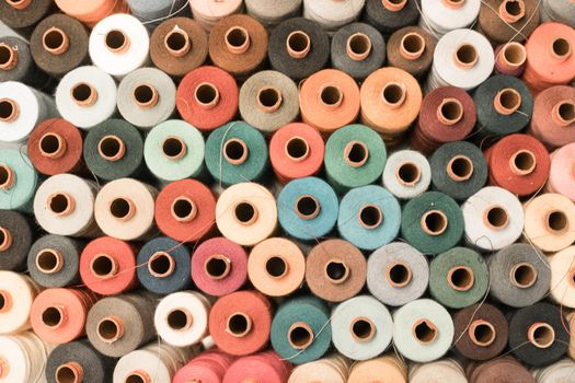 Variety of colorful sewing threads, birds eye