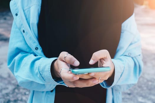 Woman hand using smartphone to do work business, social network, communication concept.