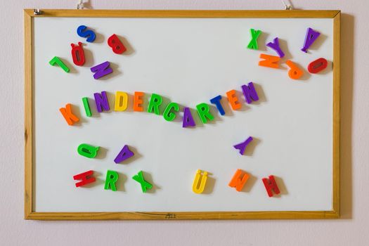 Colorful letters with the word “Kindergarten”