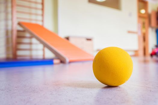 Close up of toy foam ball in a gym hall of a Kindergarten