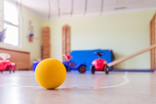 Close up of toy foam ball in a gym hall of a Kindergarten