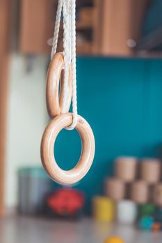 Close up of gym rings in the gym hall of a preschool