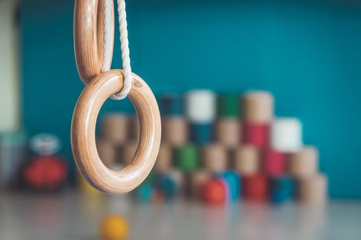 Close up of gym rings in the gym hall of a preschool