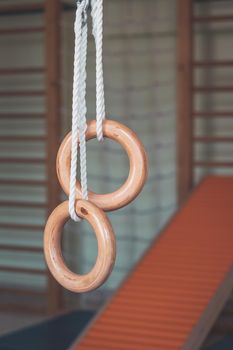 Close up of gym rings in the gym hall of a preschool