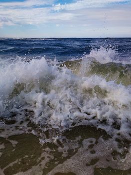 Mesmerizing view of a wave splashing on the Baltic sea