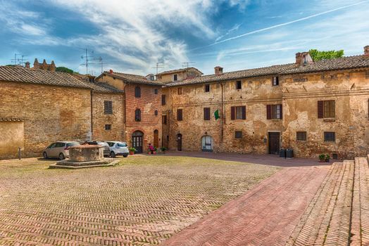 View of Sant'Agostino square in the medieval town of San Gimignano, Italy