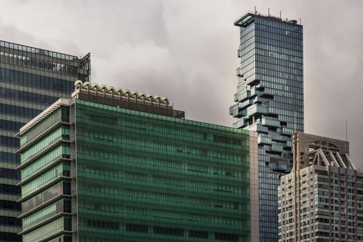 Detail of Modern Office building in downtown Bangkok. Modern architecture building background good for patterns and backgrounds. Selective focus.