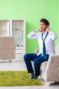 Man dressing up and late for work