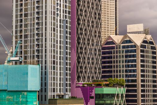 Detail of Modern Office building in downtown Bangkok. Modern architecture building background good for patterns and backgrounds. Selective focus.