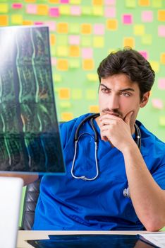 Young doctor with many reminders and urgent work