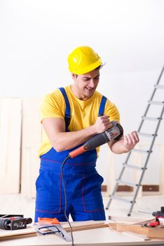 Floor repairman disappointed with his work 