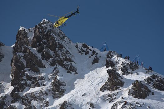 Ordino Arcalis, Andorra: 2021 February 24: Helicpoter in action at the Freeride World Tour 2021 Step 2 at Ordino Alcalis in Andorra in the winter of 2021.