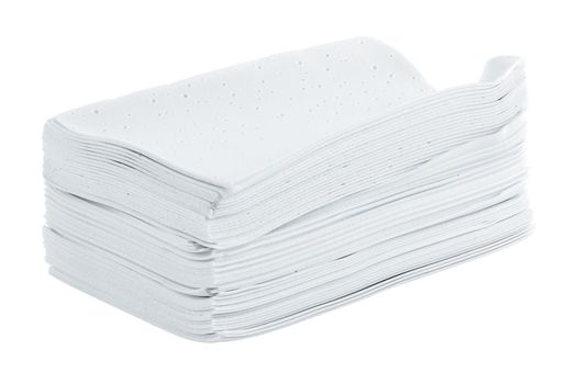 stack of white liquidless and powderless laundry detergent squares sheets isolated on white background.