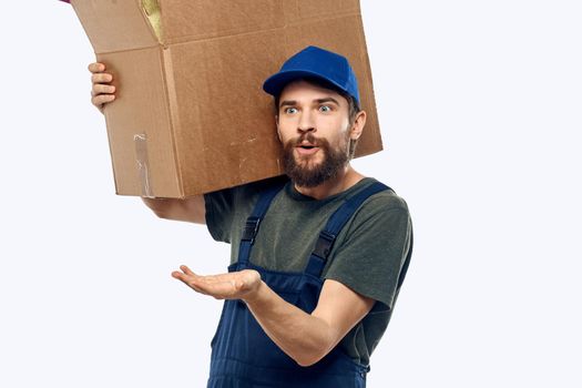 Man worker in uniform providing loading delivery service. High quality photo