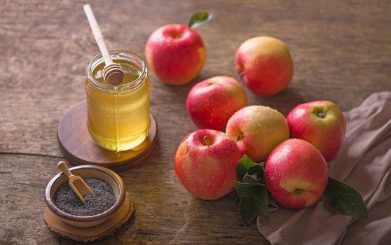 Apple and honey, traditional food. Selective focus. Copyspace background