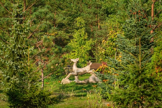 Figurine of a deer in the garden