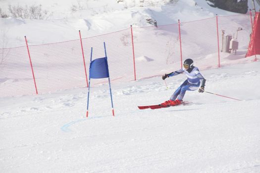 Super G race, alpine skier attack ski gate competition