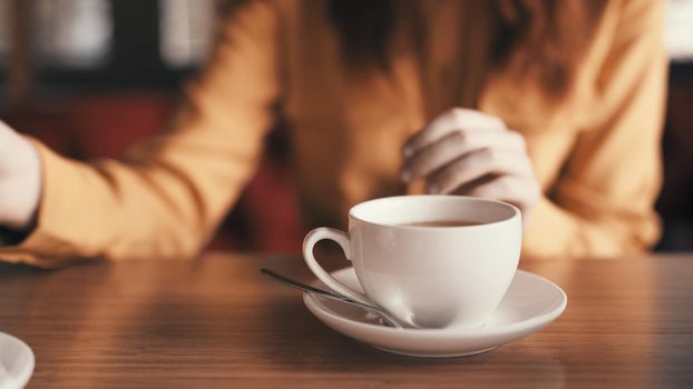hot tea in a cup on the table breakfast as a lifestyle. High quality photo