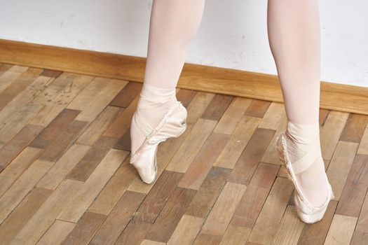Legs ballerina pointe shoes exercise silhouette performance. High quality photo