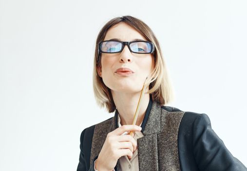 Woman with glasses and a jacket business finance stationery. High quality photo