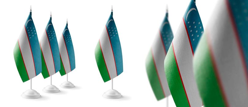 Set of Uzbekistan national flags on a white background.