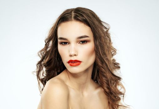 romantic woman with beautiful hairstyle and makeup red lips. High quality photo