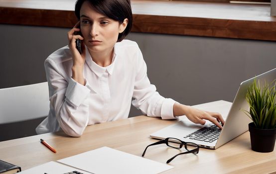 Business woman working desk laptop internet technology professional. High quality photo