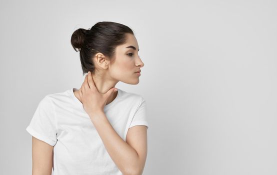 woman holding neck health problems discomfort medicine treatment. High quality photo