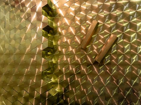 lathe cut yellow brass hex rods laid out tightly - full frame industrial background