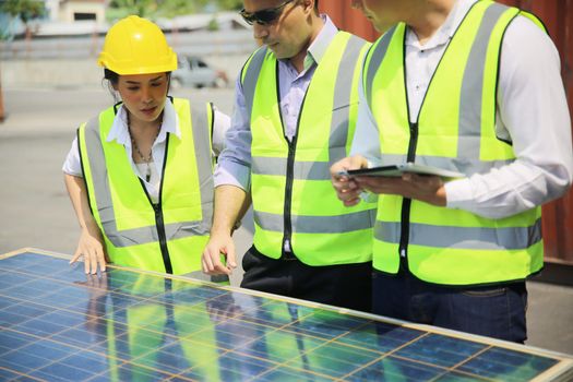 technicians install panels Solar cells to produce and distribute electricity. Energy technology concept