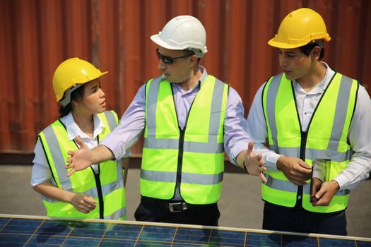 technicians install panels Solar cells to produce and distribute electricity. Energy technology concept