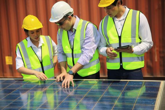 technicians install panels Solar cells to produce and distribute electricity. Energy technology concept