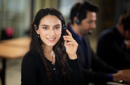 Colleagues working in a call center.