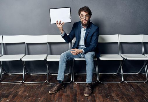 A man holds in his hands a job interview standby. Professional manager. High quality photo