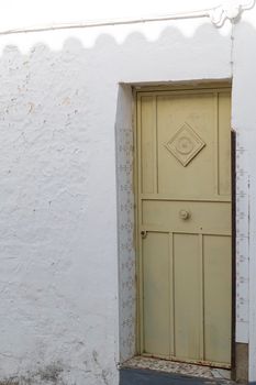 Door of a rustic house, in a village of Andalusia in southern Spain